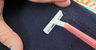 ازالة الوبر من الملابس